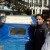 Counselor of 15 no ward of Chittagong City Corporation attaching smoke-free stickers behind the Taxi with the support of YPSA