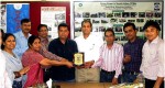YPSA officials are handing over official crest (Memento) to Adv. Moktader Billah.
