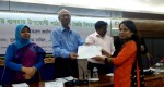 Ms. Shahed Khanam Naly receiving certificate from Education Minister