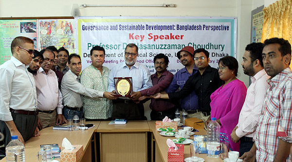 YPSA handovers a crest to Dr. Hasanuzzaman Chowdhury