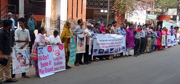 Human chain formed demanding to insert pictorial warning signs on tobacco products
