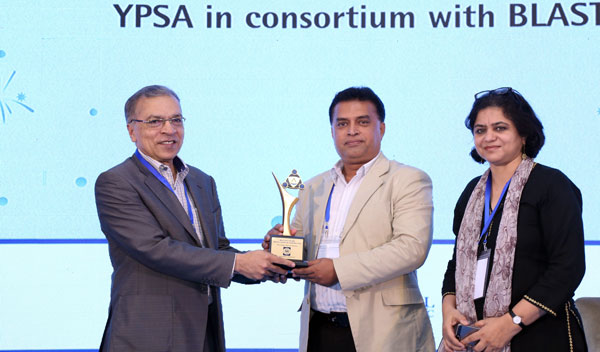 Chief Executive of YPSA Md. Arifur Rahman receives the award crest