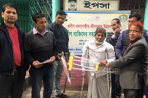 walking stick distributed to a elderly person