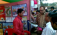Secretary visits YPSA stall at Ramu