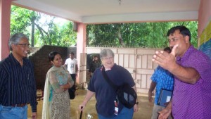 USAID evaluation team members in front of Shelter Home