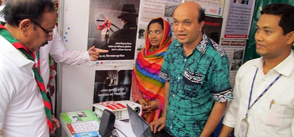 Minister of Primary and Mass Education Bangladesh visiting YPSA stall at the education fair