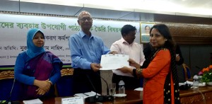 Ms. Shahed Khanam Naly receiving certificate from Education Minister