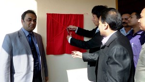 Mr. Hideshi Sasahara, First Secretary of the Japan Embassy in Bangladesh uncover the founding stone of Cox's Bazar at the opening ceremony.