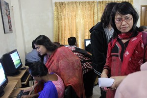 Visitors talking with PWDs at the Computer lab