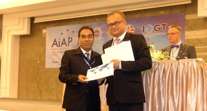 Mahabubur Rahamn receiving certificate from president of IOGT International.