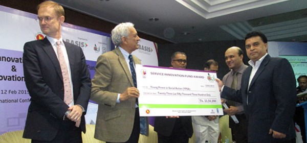 honorable adviser of the Prime Minister Prof. Dr. Gowher Rizvi handover the cheque to Md. Arifur Rahman, CE and Vashkar Bhattacharjee. PM of YPSA