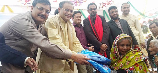 Dr. Hasan Mahmud MP in an insecticidal net distribution ceremony organized by YPSA