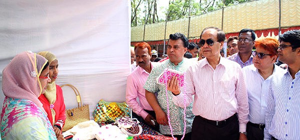 Managing Director of PKSF visiting a stall at the fair