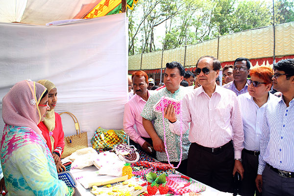 Managing Director of PKSF visiting a stall at the fair