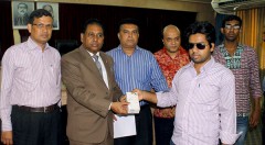 Visually impaired student of University of Chittagong receiving smart phone
