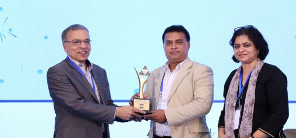 Chief Executive of YPSA Md. Arifur Rahman receives the award crest