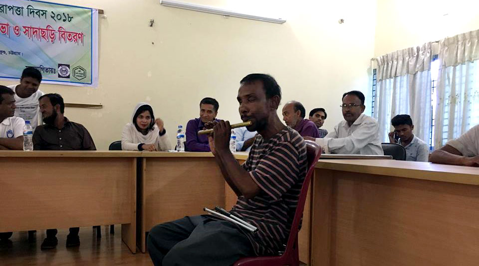 Flute playing by a visually impaired person in the occasion