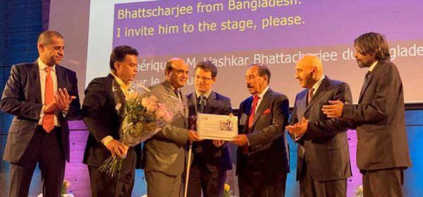 Vashkar of YPSA from Bangladesh receiving UNESCO award