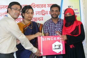 YPSA distributes sewing machine to a climate displaced woman