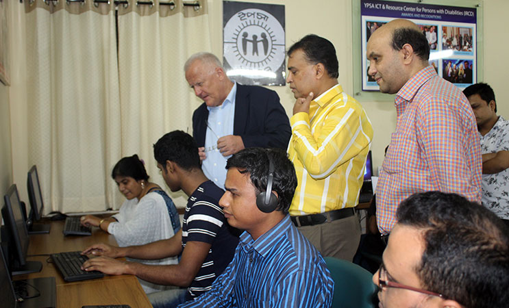 Visually impaired student demonstrates Computer use