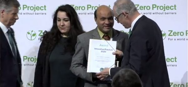 Vashkar receiving the award.