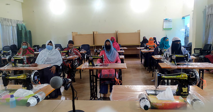 women entrepreneurs receive sewing machines from YPSA