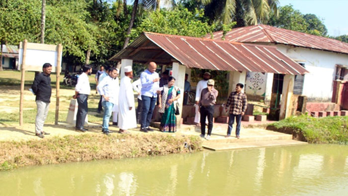 village pond and visitors 