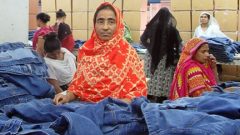 Nargis Sultana working in a factory