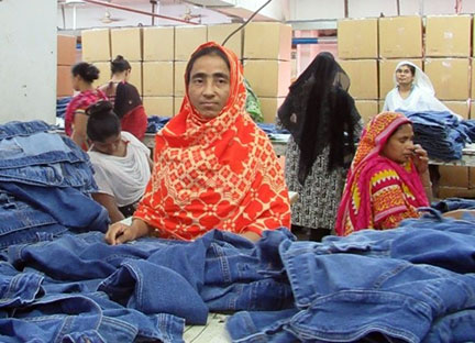 Nargis Sultana working in a factory