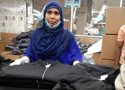 Razia Sultana inside a factory 