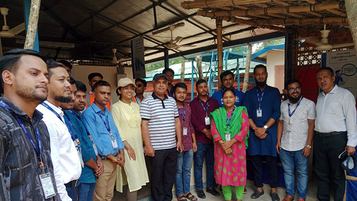 Group photo in fron of Rohingya camp in Ukhiya