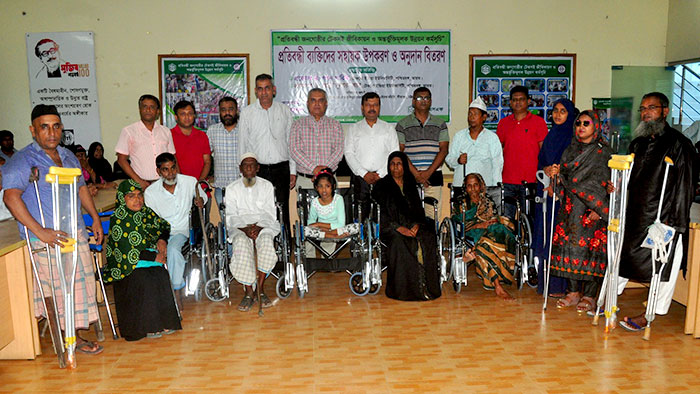 Assistive device distribution group photo