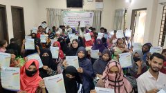 Women participants are showing their certificates