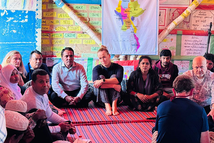 visitors in meeting at the the camp