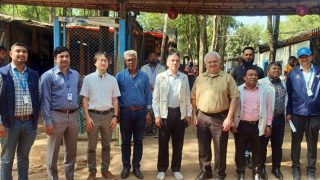 Group photo of WFP) delegation and YPSA officials in front of the Outlet.