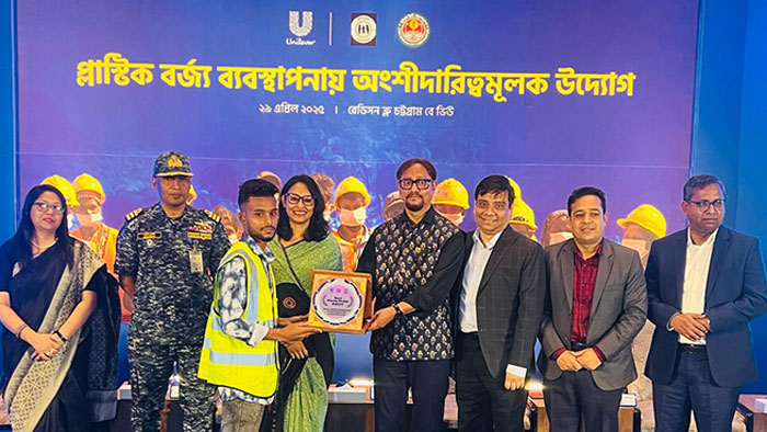 Award plaque handover to a volunteer 