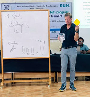 Trainer showing something  