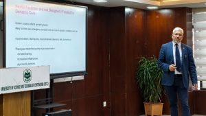 Professor Dr. Hafiz T. A. Khan presenting statistics 