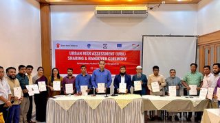 Group photo. People with holding booklet